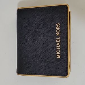 Michael kors black and goldcard case
